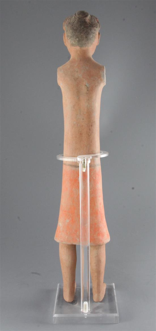 A tall Chinese pottery stick figure of a man, Han dynasty, height 62cm